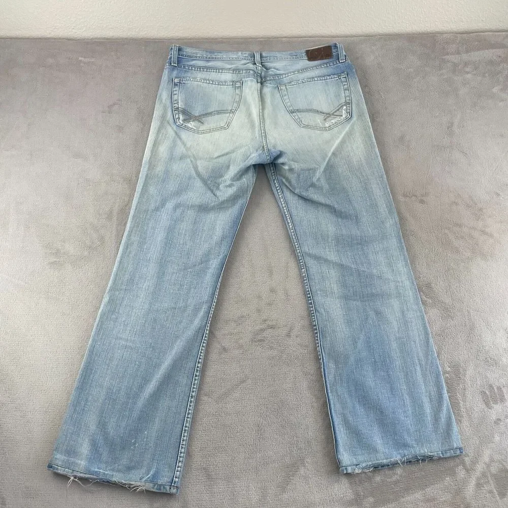 VTG BKE 67Jeans Buckle 36x33 Light Blue Wash Denim‎ Distressed Wide Leg Tyler